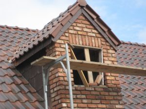 Rénovation de toiture en tuiles par l'entreprise de bâtiment SGP