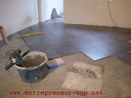 Rénovation intérieure par la pose de carrelage en pointe par Ets SGP